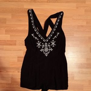 F21 Deep V Black Romper with White Details